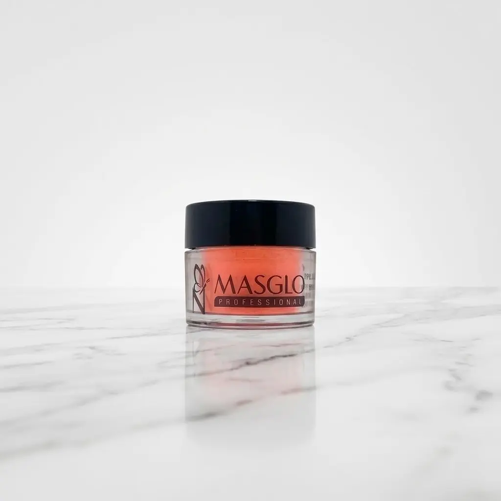 Polvo acrílico Masglo color neon naranja exhibido sobre superficie tipo mármol para uñas acrílicas profesionales
