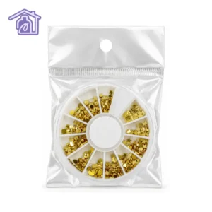 rueda carrusel organizador con remaches metalizados dorados en varias formas geometricas para decoracion de unas