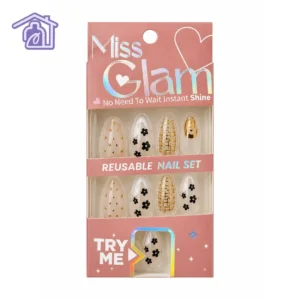 caja de unas postizas press on reutilizables marca miss glam con diseno decorado de flores negras puntos y trama dorada