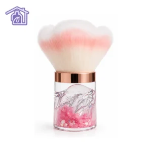 brocha bledo de lujo para unas con base de cristal transparente rellena de destellos rosados y cerdas tupidas en degrade